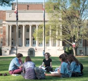 UA students sitting on the quad during the spring